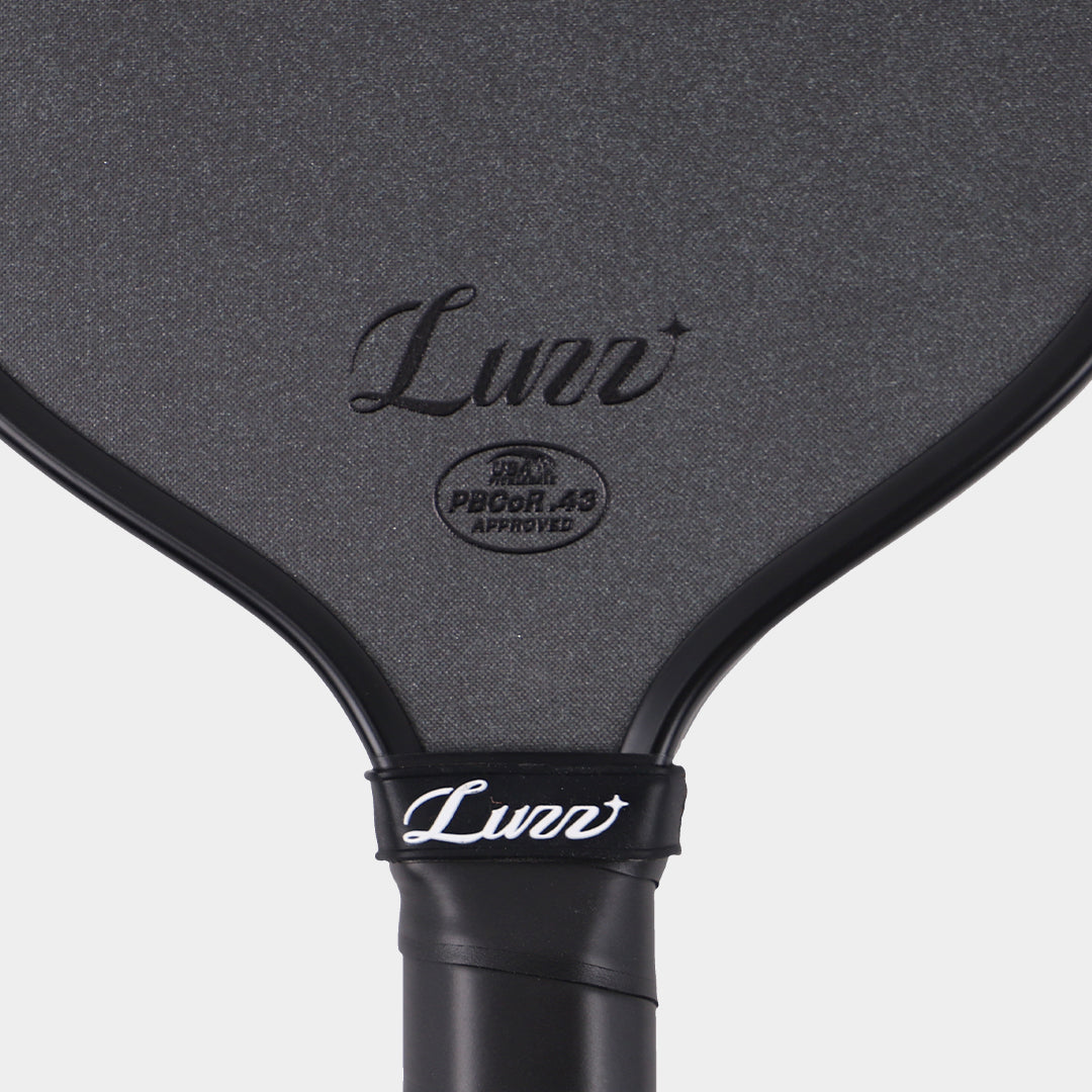 Luzz Cannon XPP M1 textured face close-up with logo and approval mark